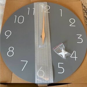 Modern Gray Wall Clock with White Numerals and Wood-Tone Hands